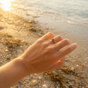 Anello regolabile con sabbia del mediterraneo