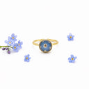 Anello regolabile in resina e fiore di non ti scordar di me