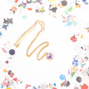 Collana con ciondolo con coriandolo