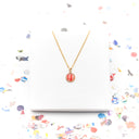 Collana con ciondolo con coriandolo