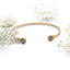 Bracciale rigido con fiore di carota selvatica