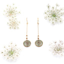 orecchini pendenti con perle e fiori di carota selvatica