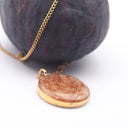 Collana con ciondolo in resina e fico