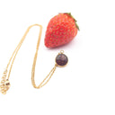 Collana con ciondolo con fragola