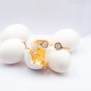 Bracciale rigido con guscio d'uovo e foglia d'oro