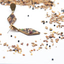 Orecchini pendenti con mangime per volatili