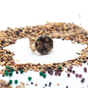 Anello in ottone con mangime per volatili