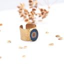 Anello a fascia in ottone con seme di ombrellino pugliese