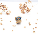 Anello a fascia in ottone con seme di ombrellino pugliese