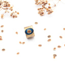 Anello a fascia in ottone con seme di ombrellino pugliese