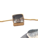 Bracciale quadrato con inserto di plastica e conchiglia