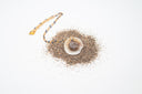 collana con ciondolo in resina e sabbia