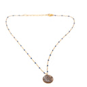 collana con ciondolo in resina e sabbia