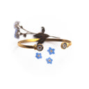 Bracciale rigido in ottone regolabile con fiore di non ti scordar di me
