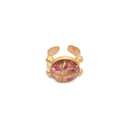 Anello in ottone con ritagli di fiori e frammenti dorati