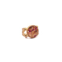 Anello in ottone con ritagli di fiori e frammenti dorati
