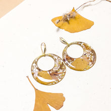 Load image into Gallery viewer, Resin hoop earrings with real spirea and lupine flowers
