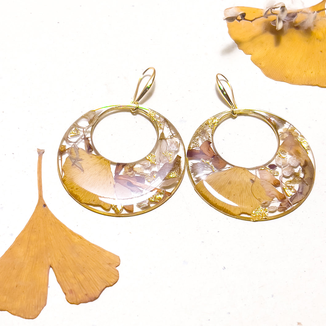 Resin hoop earrings with real spirea and lupine flowers