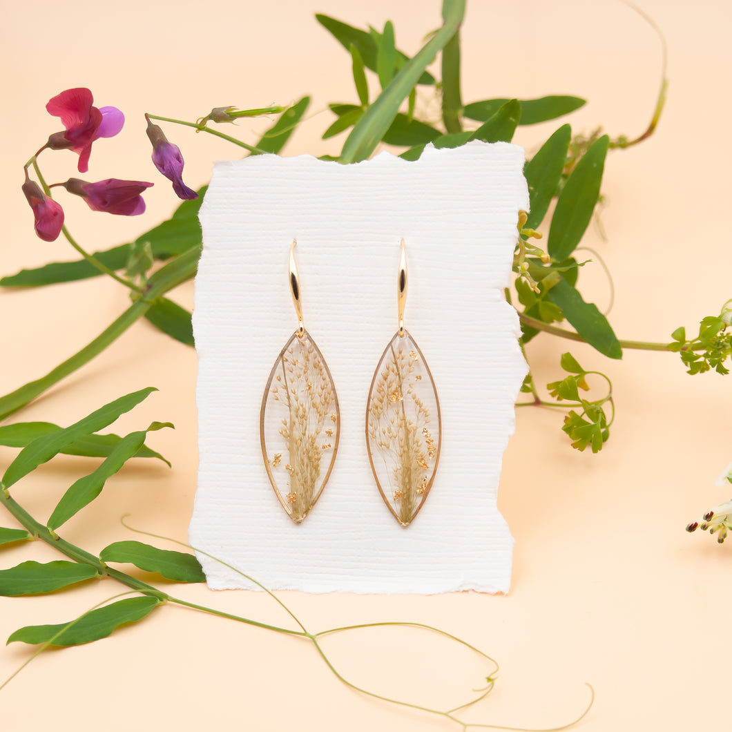 Drop earrings with wild plant and gold leaves