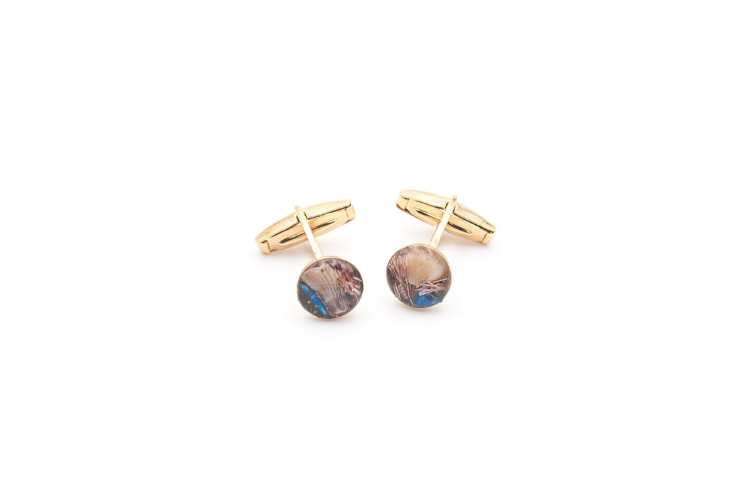 Cufflinks for men in brass with inclusions of marine and plastic materials