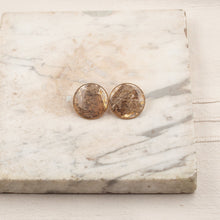 Load image into Gallery viewer, Resin lobe earrings with lemon leaf skeleton and gold fragments

