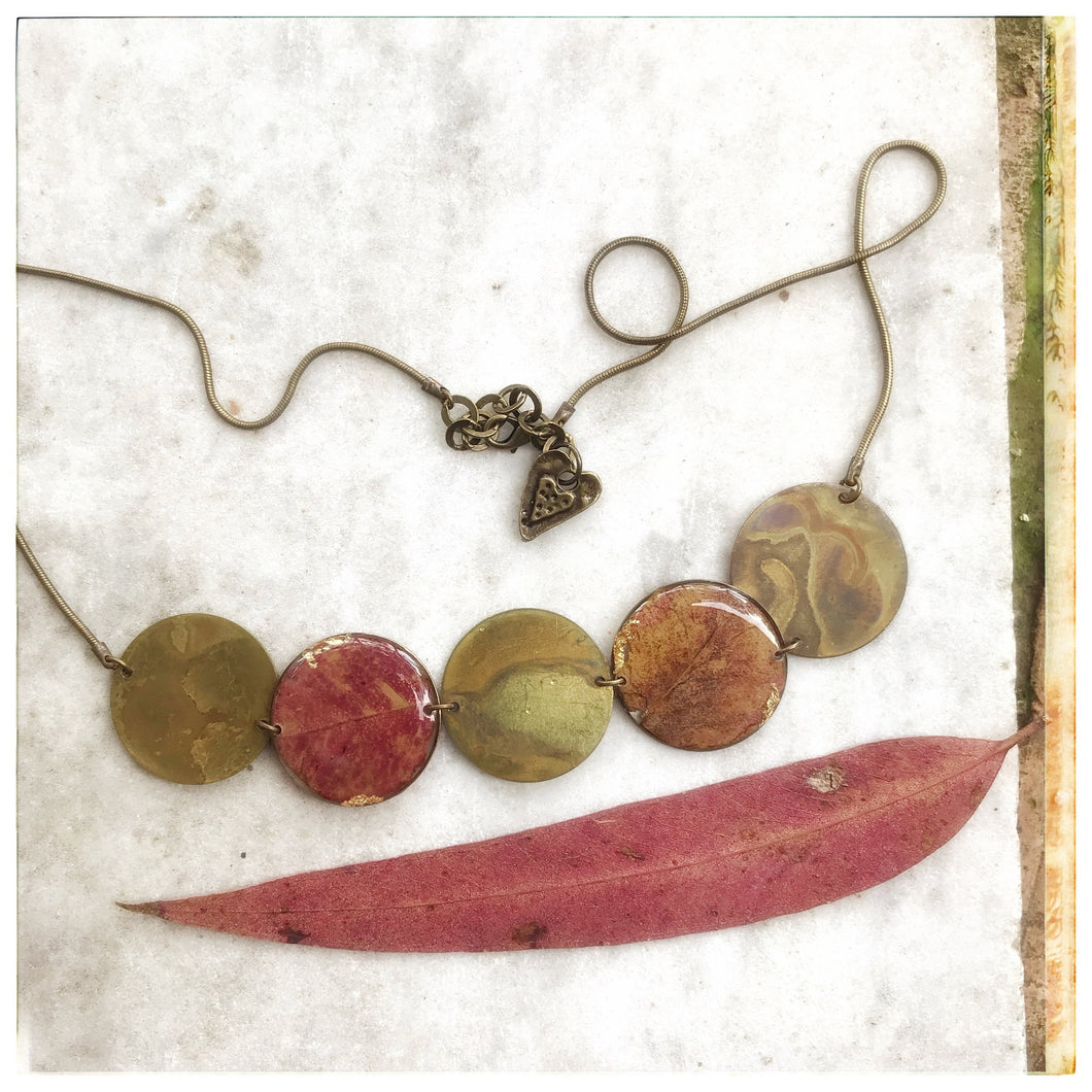 Choker necklace with brass pendants and eucalyptus leaves