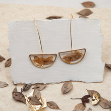 Load image into Gallery viewer, Half moon pendant earrings with butcher&#39;s leaf and gold fragments
