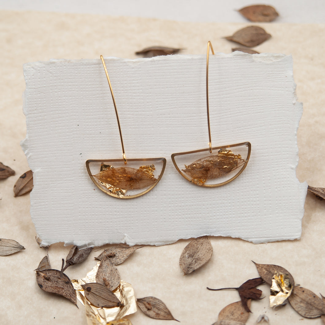 Half moon pendant earrings with butcher's leaf and gold fragments